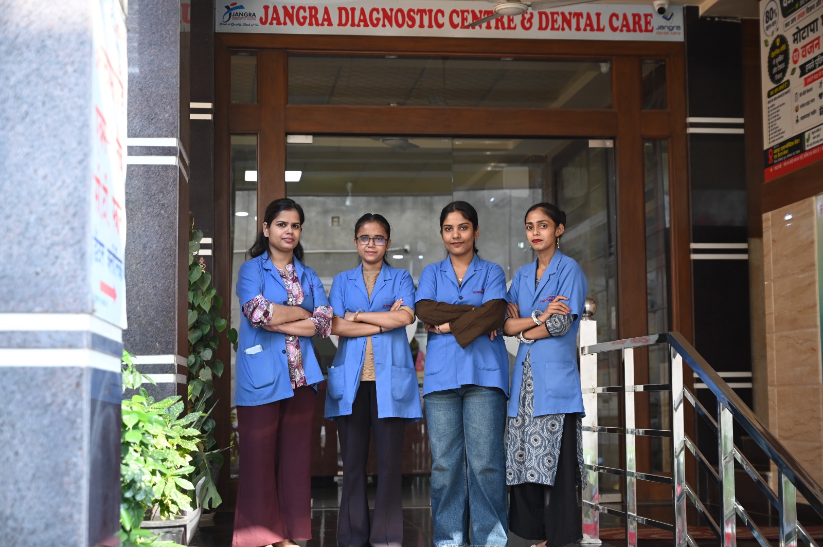 Clinical nursing and technical staff at Jangra Diagnostic Centre entrance